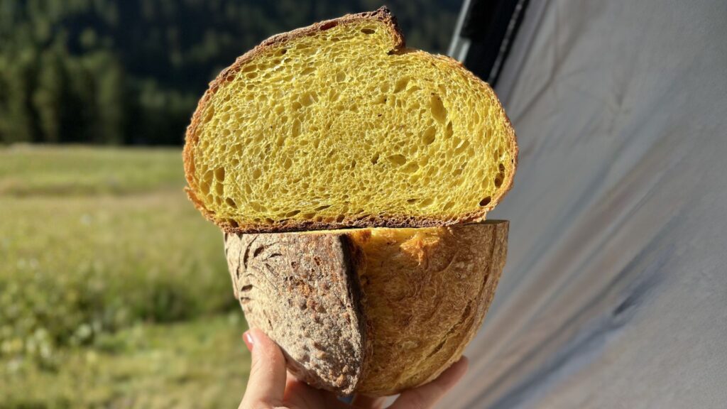 turmeric and black pepper sourdough loaf showing golden crumb
