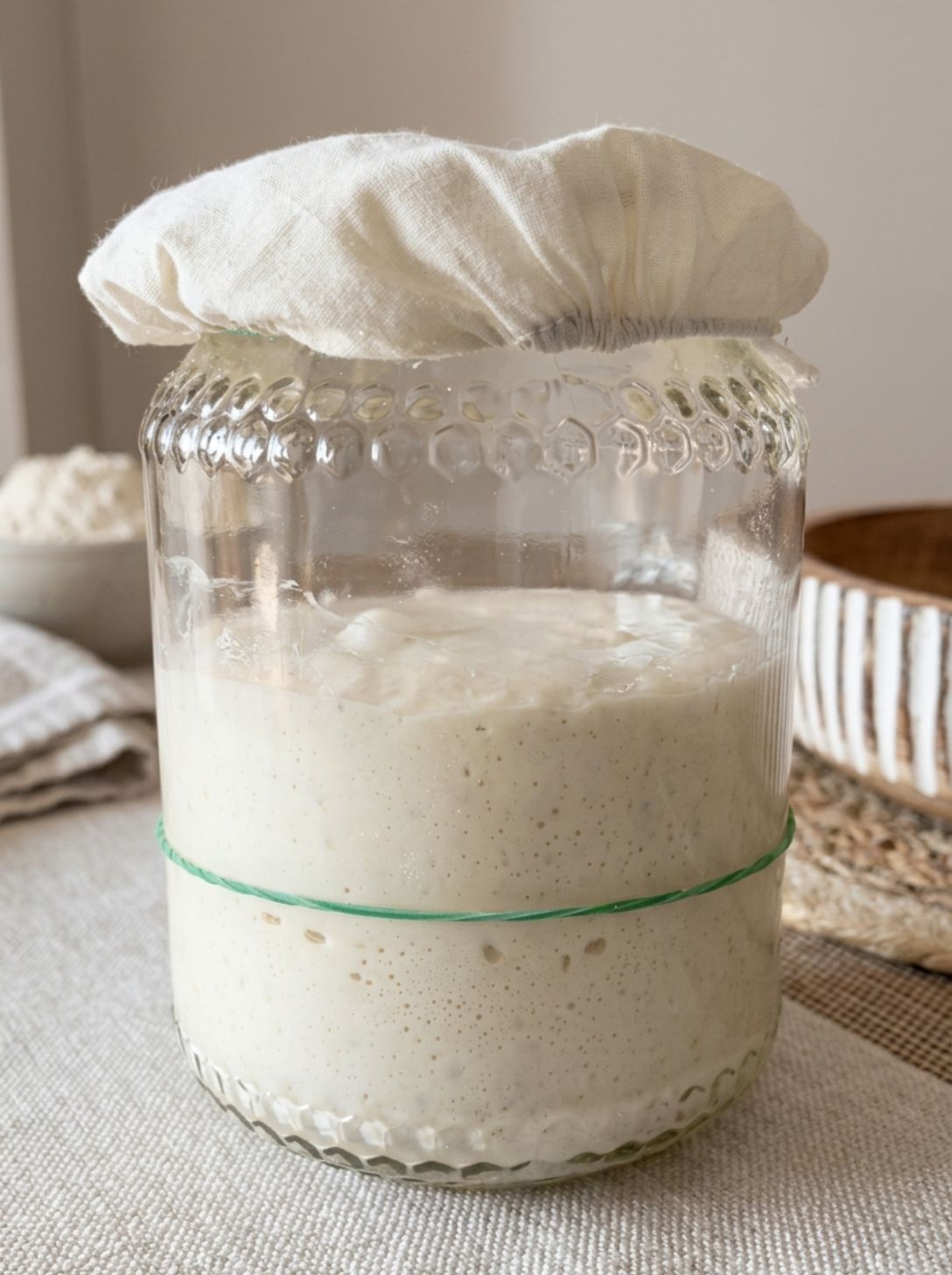 Close-up of sourdough starter with bubbles distributed throughout, not just on the surface