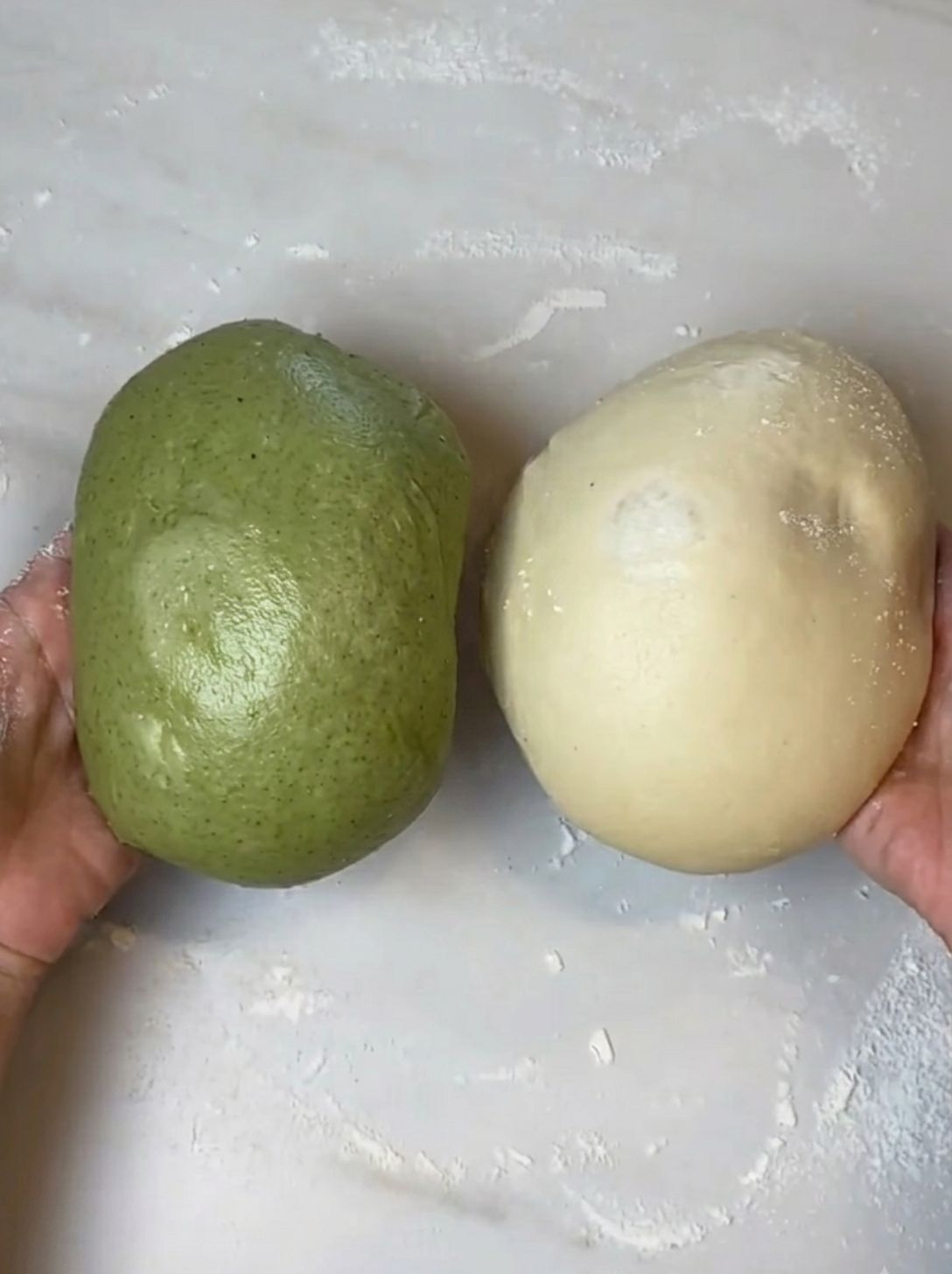 Plain brioche dough next to matcha-colored dough before stacking